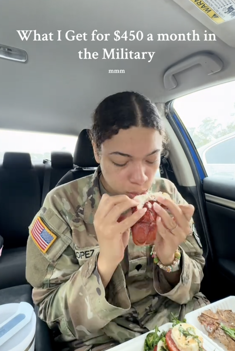 woman eating lobster in her car
